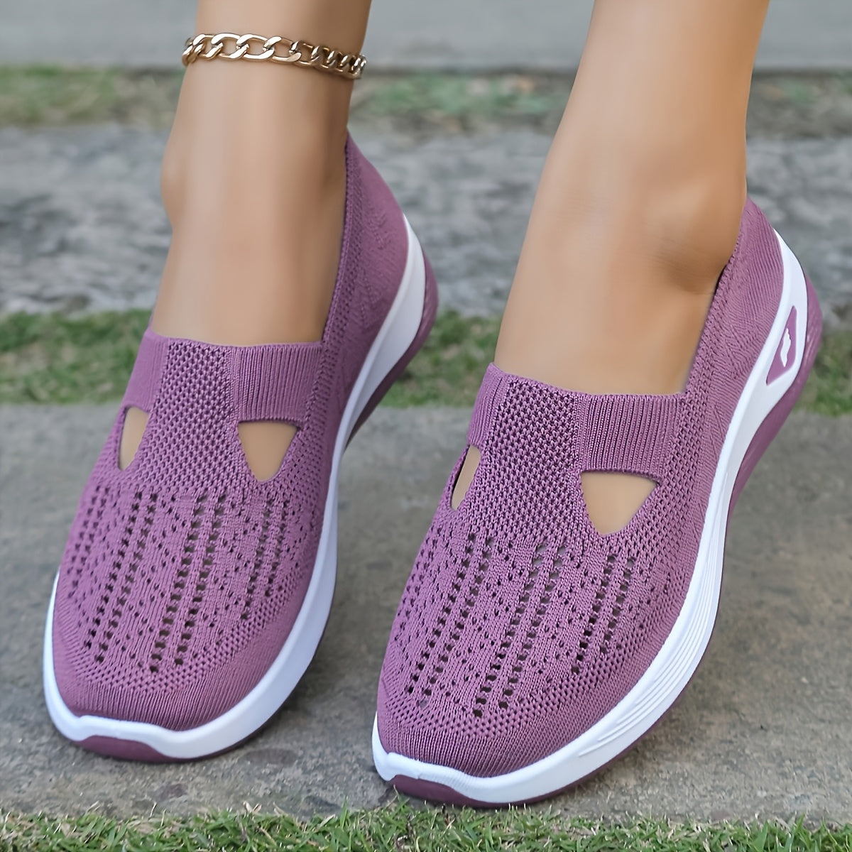 Breathable mesh slip-on sneakers with PVC sole, fabric insole, and lining for stability and comfort. Perfect for casual outdoor wear in spring and summer. Features cut-out patterns and