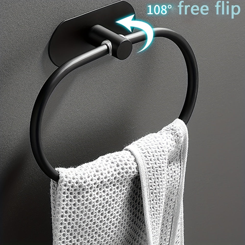 Self-adhesive stainless steel bathroom accessories for towel and dishcloth storage.