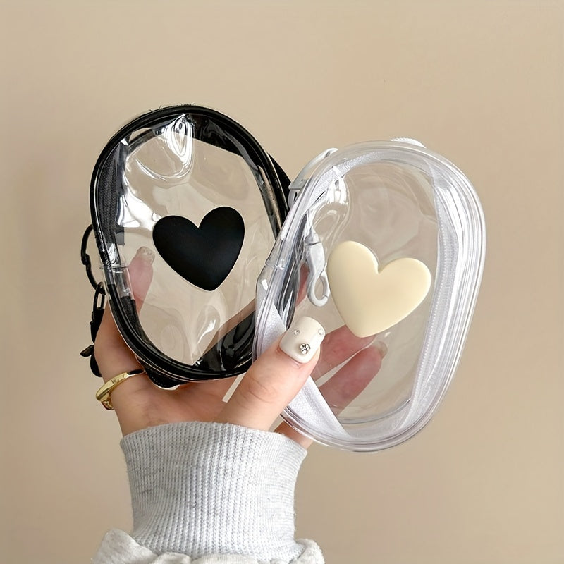 Waterproof heart-shaped PVC bag with keychain for organizing cables and headphones.