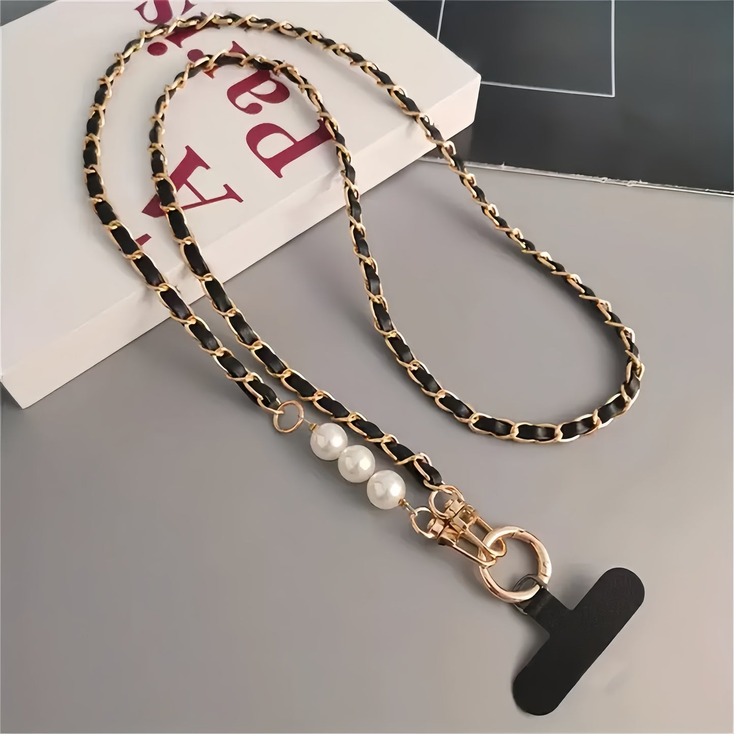 Chic lanyard for phones and bags, perfect for any occasion.