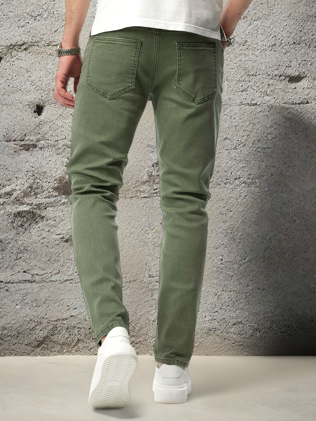 Stretchy denim jeans for men, ideal for casual outdoor wear.