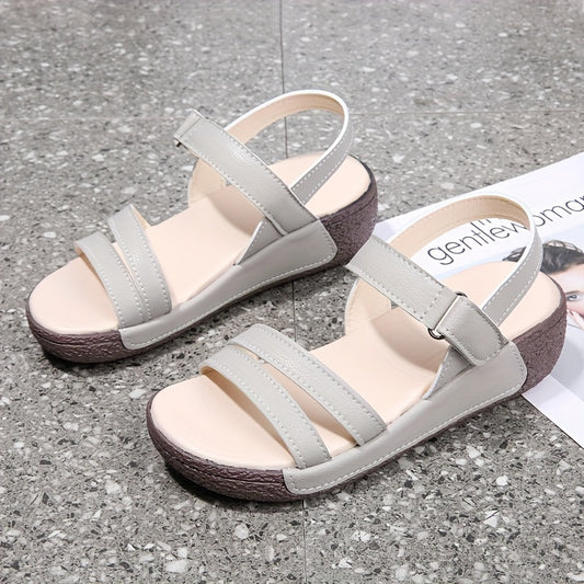 Platform sandals for women with ankle buckle strap, soft sole, and non-slip wedge.