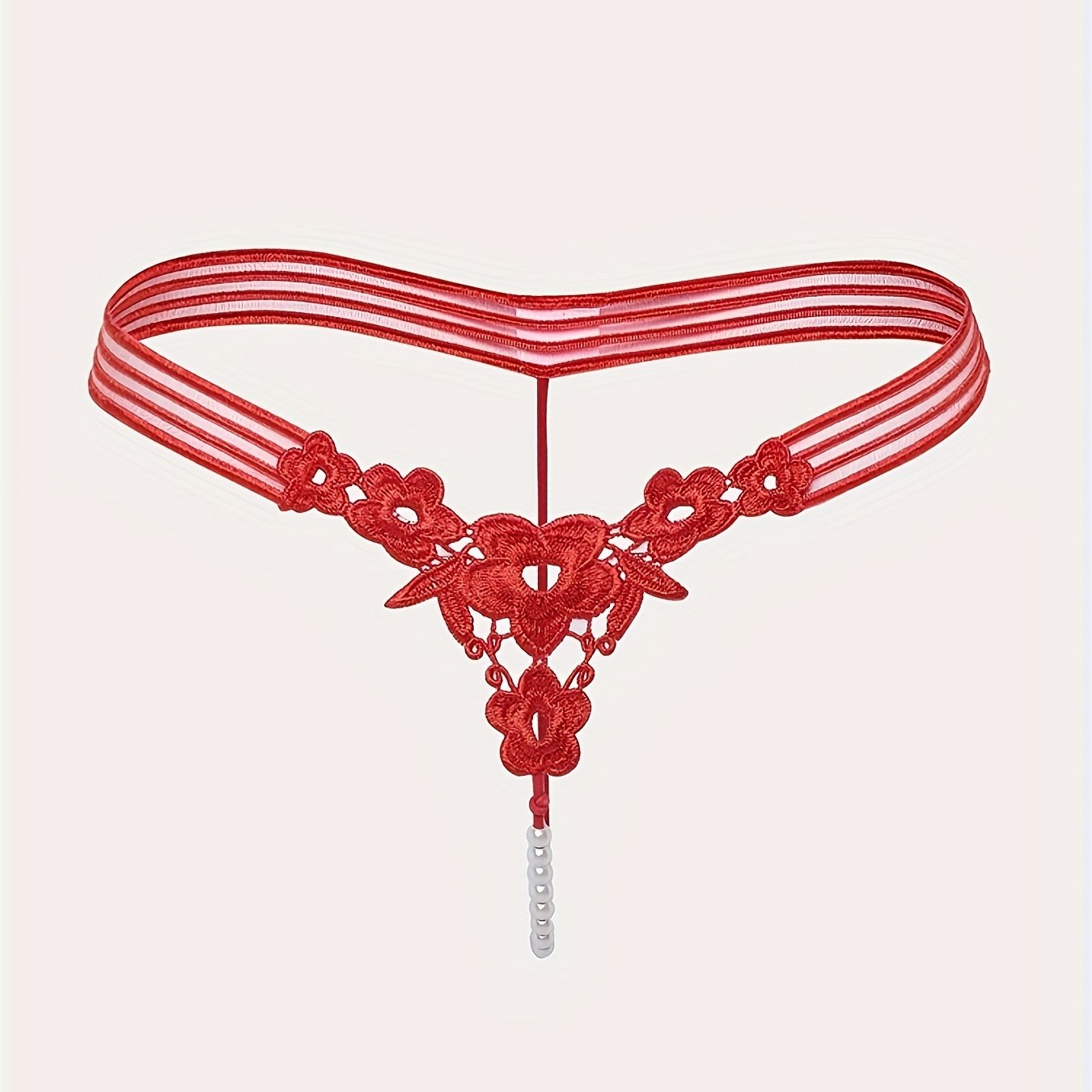 Sexy bead thong panties for women in red, made of 100% polyester knit fabric. Features solid color, mini embroidered V-string, drop waist, and adult thong style.