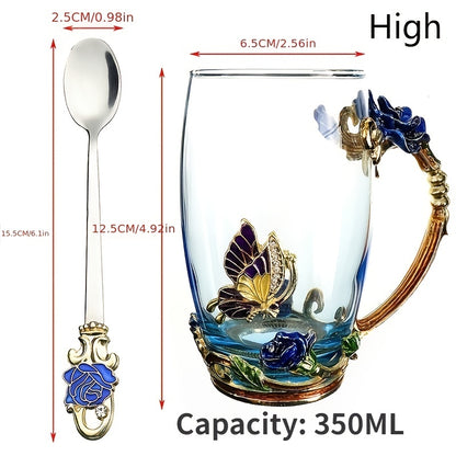 Rose enamel crystal tea cup with butterfly and rose design, includes spoon, clear glass.