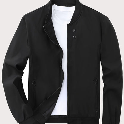 Solid color polyester jacket with zipper, stand collar, pockets, regular fit, and long sleeves. Suitable for all seasons with 100% polyester lining and 125g/m² fabric weight.