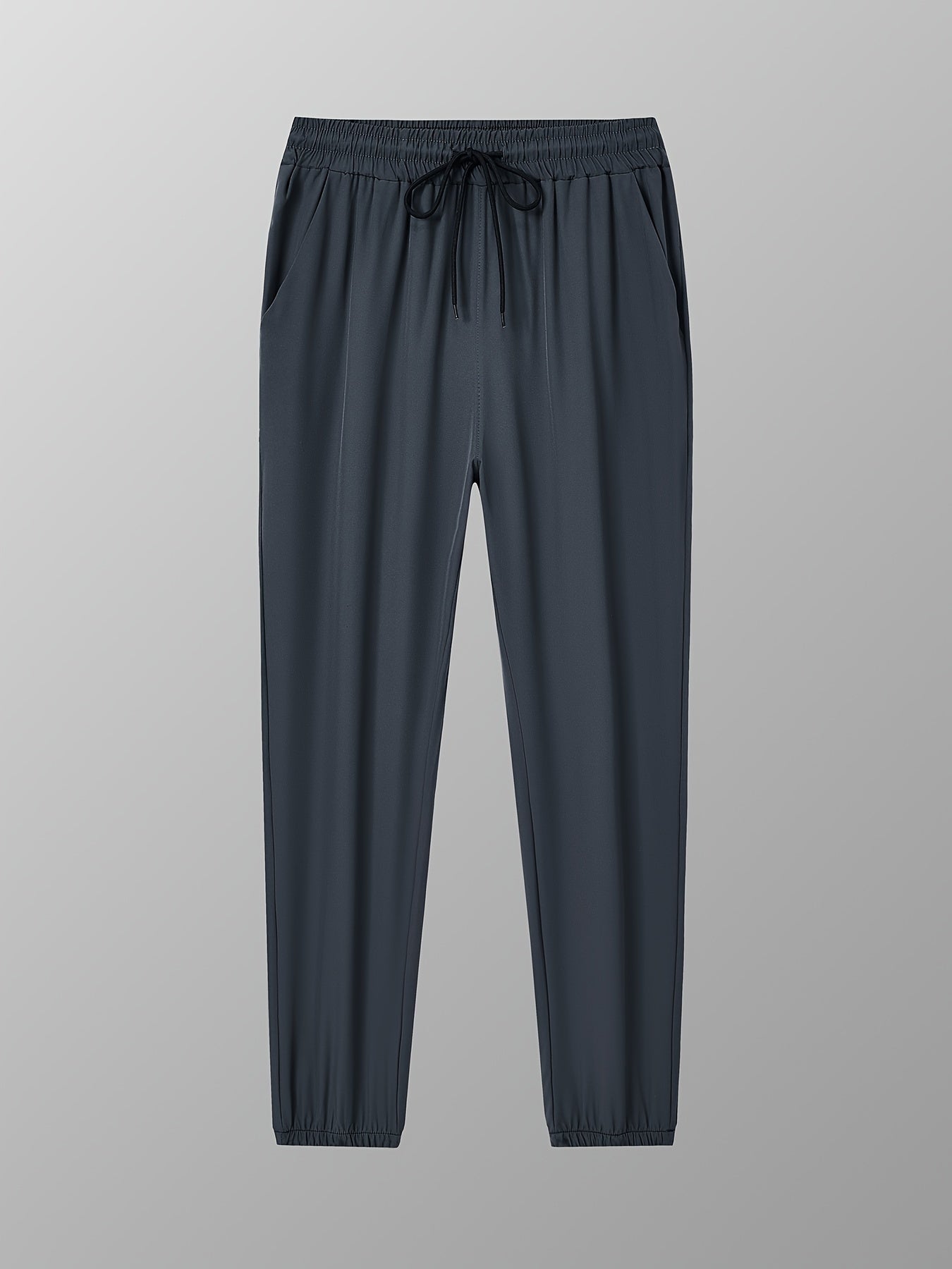 Men's drawstring trousers with pockets for outdoor activities in spring and summer.