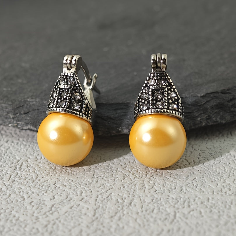 Vintage Bohemian-inspired drop earrings in stainless steel, adorned with rhinestones and faux pearls, ideal for a casual chic look.