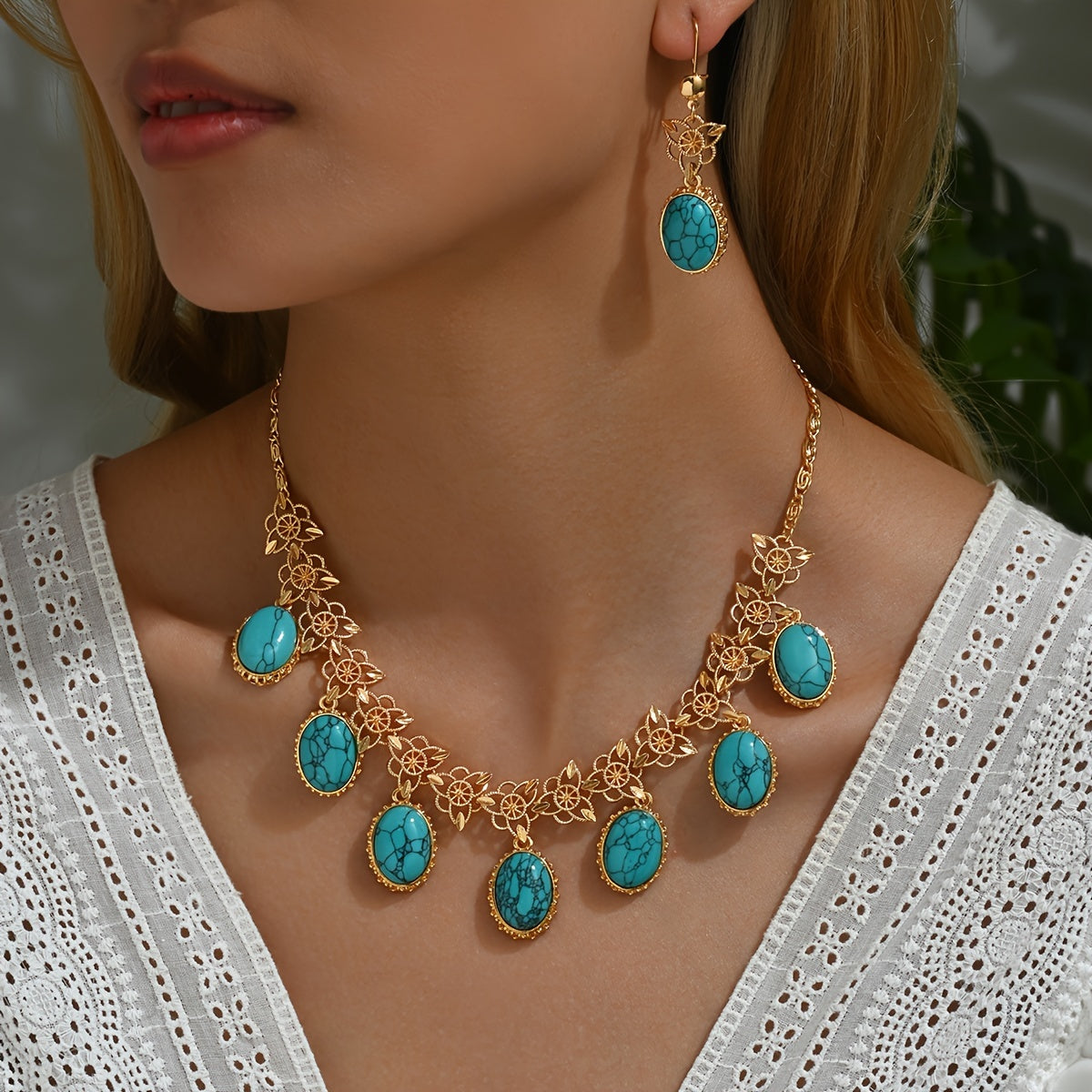 Luxurious and versatile evening dress jewelry set in a three-piece Middle Eastern New Style. Featuring multi-pendant stone hollow earrings and necklace, this exaggerated fashion set exudes high-end luxury. The retro bohemian ethnic style adds a unique