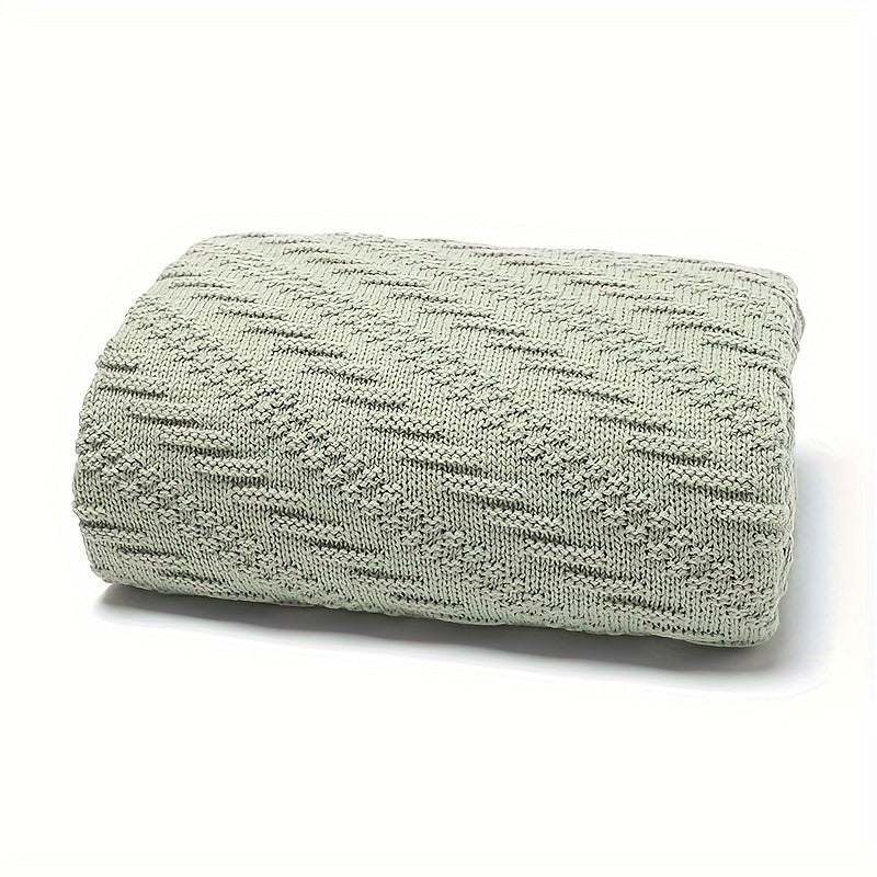 Soft, solid color blanket perfect for home and travel use, hand-knitted with care.