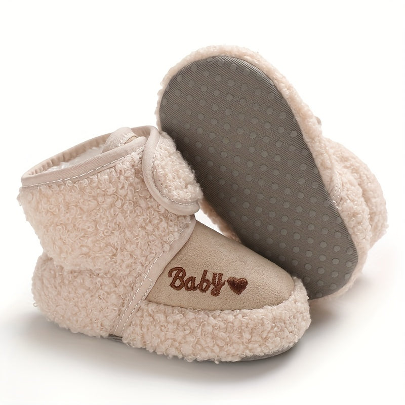 Cozy boots for baby boys and girls, featuring hook and loop fasteners for indoor and outdoor winter walks.