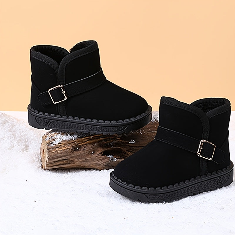 Children's winter boots with cozy fleece lining, warm and breathable, slip-on style with metal buckle straps, available in black and brown for boys and girls.