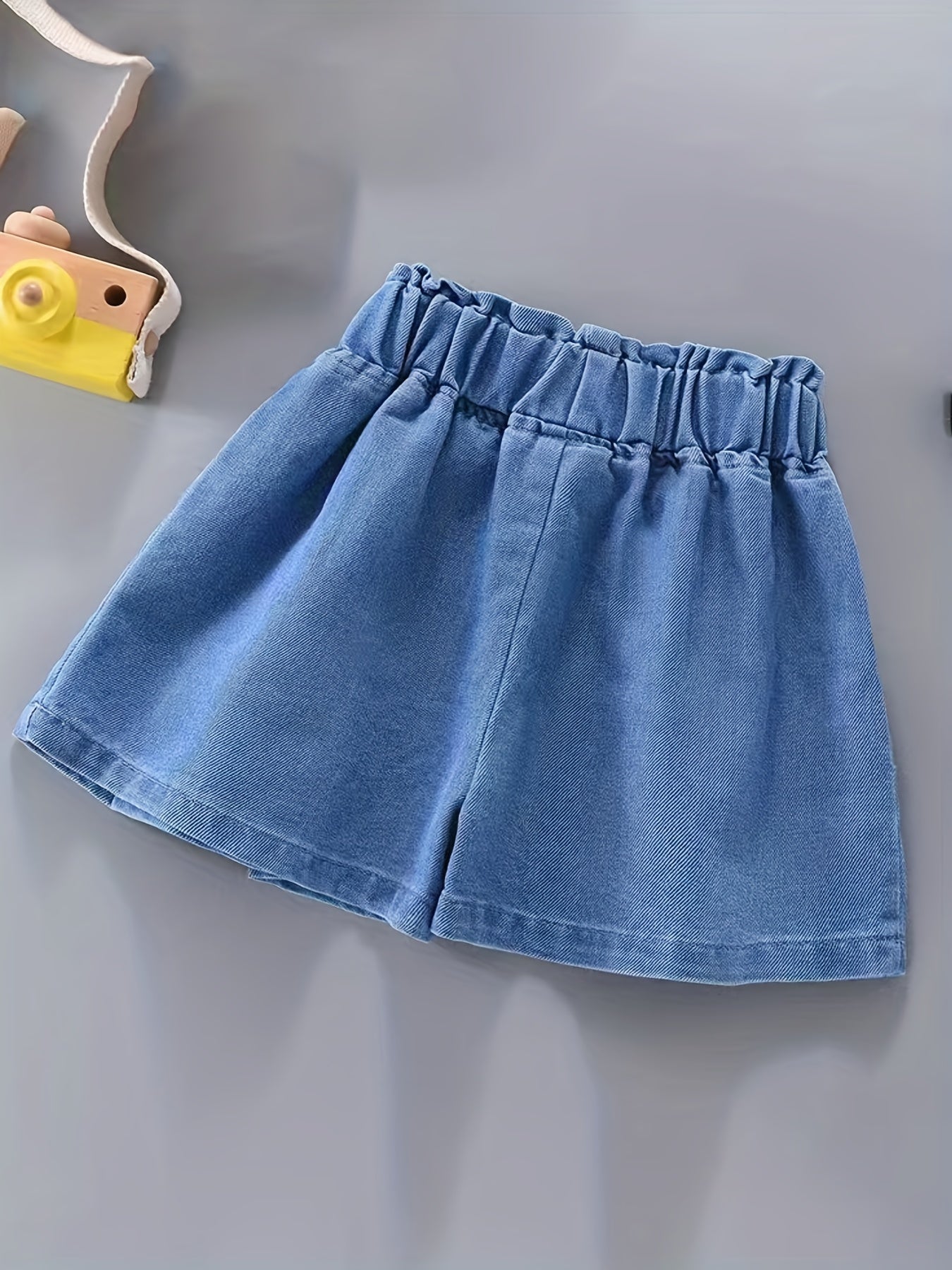 Girls' denim pleated skirt and ruffled shorts for summer, perfect for daily wear or beach holidays with a comfortable and elastic waist.