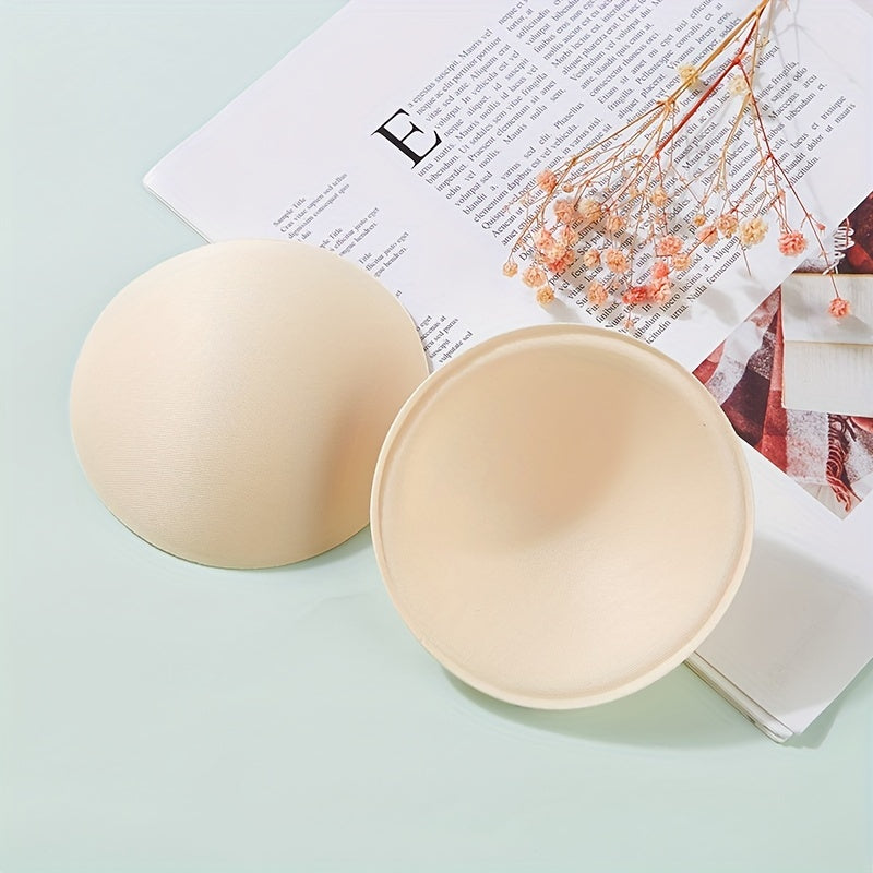 Sponge bra insert pads enhance chest invisibly for women's lingerie and underwear.