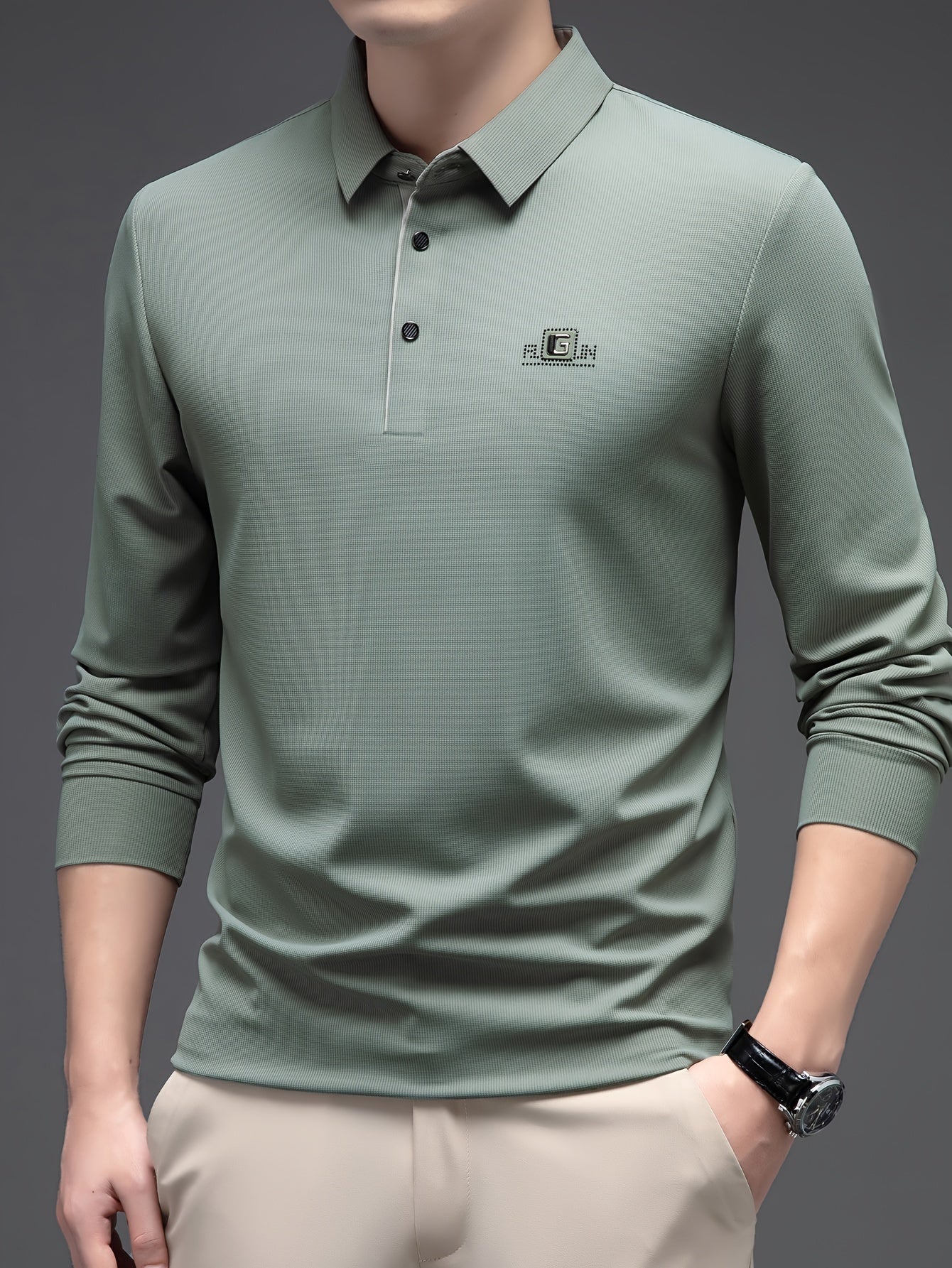 Men's lightweight long-sleeve shirt, ideal for golf and casual wear, made with breathable polyester blend.