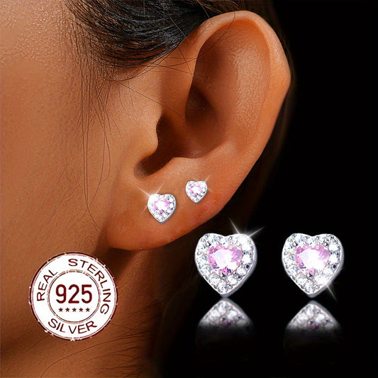 These stylish and versatile earrings are crafted from S925 sterling silver and feature sparkling zirconia in a heart-shaped design. Perfect for daily wear, gifting, or vacation, they have a silvery weight of 0.7-0.5g.