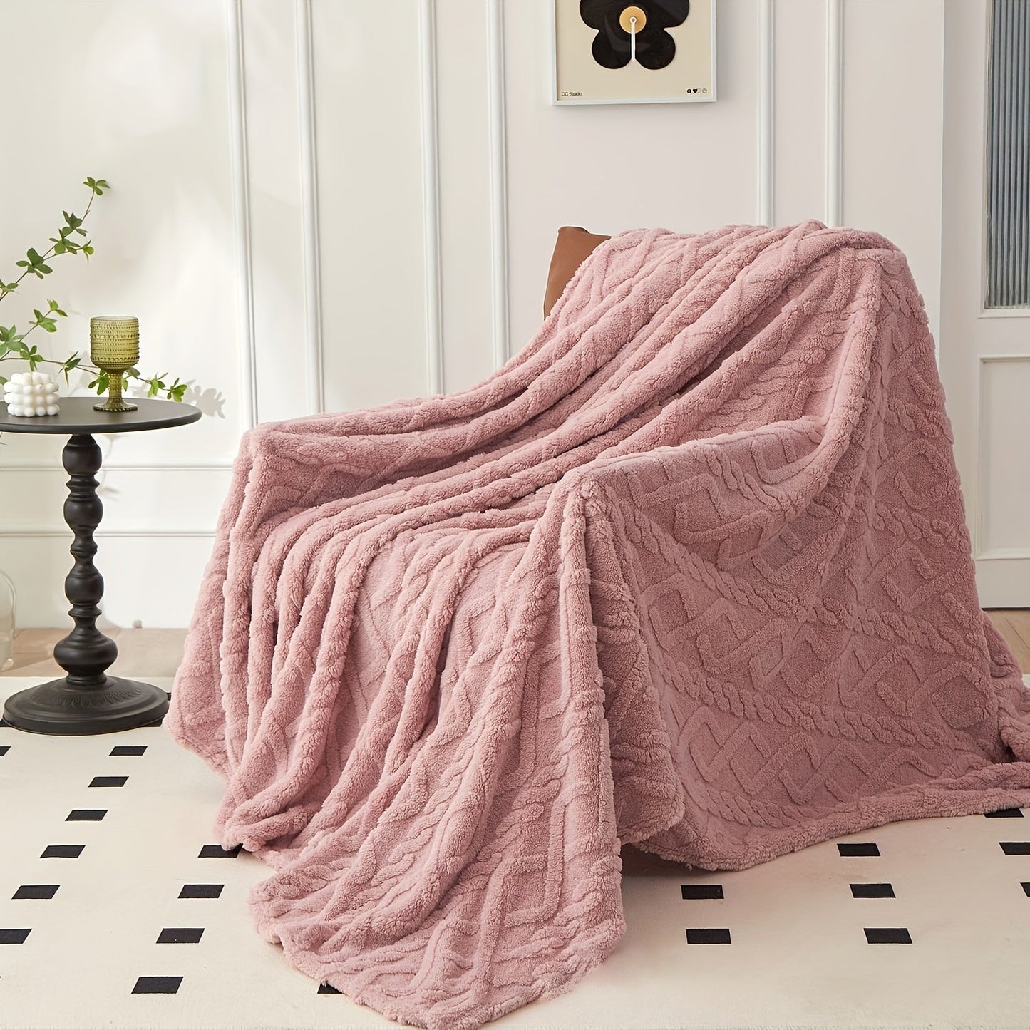 Stay cozy all year round with the July Casa Ultra-Soft Jacquard Velvet Blanket. This thick, reversible throw is perfect for any season and is machine washable for easy cleaning. Available in a beautiful green color.