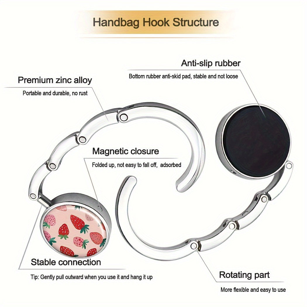 Stylish Pink Strawberry Folding Purse Hanger - Convenient Handbag Hook for On-the-Go, Perfect for Gifting during Holidays and Travel.