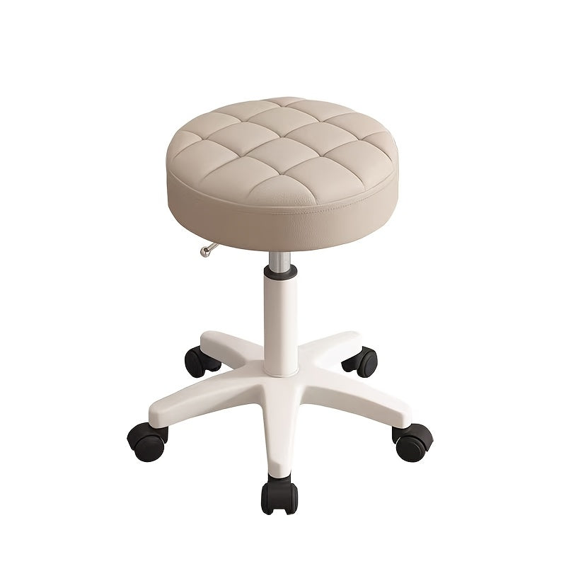 Black adjustable rolling stool with quilted plastic seat, height adjustment, perfect for salon professionals.