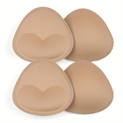 Two pairs of reusable bra insert pads for enhancing the chest invisibly.