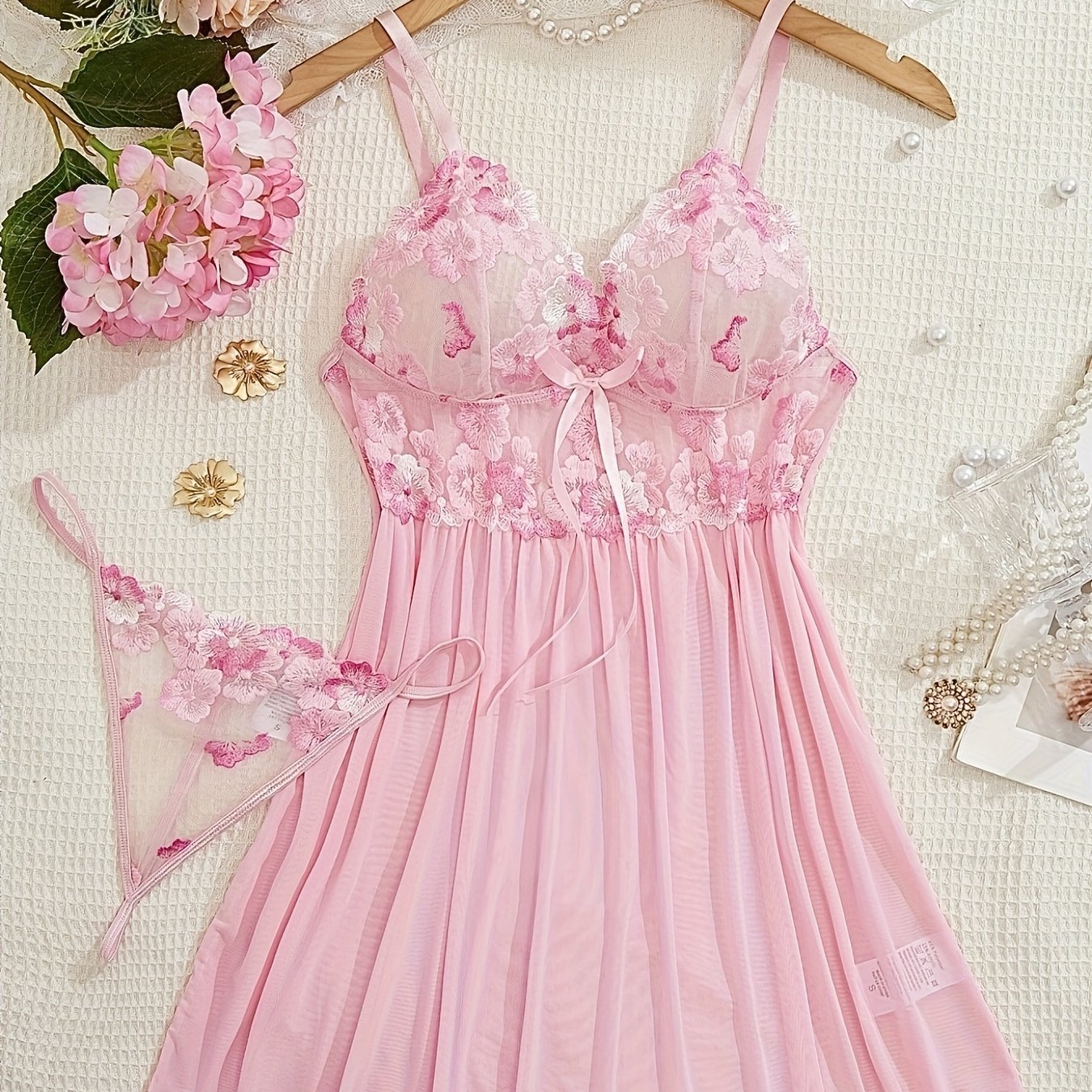 Women's sexy clothing set includes embroidered flower pattern babydoll, deep V slip dress, and thong.