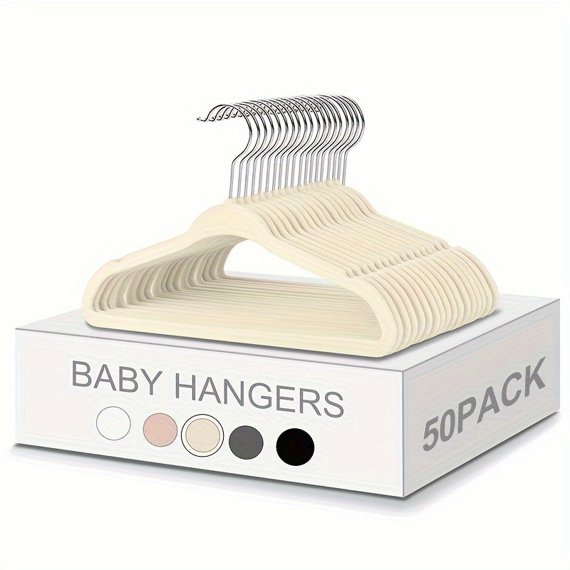 Get a 50 pack of cute and durable velvet baby hangers for your closet! These non-slip toddler hangers are the perfect size at 29.97 cm for your child's clothes. Perfect for newborns and children.