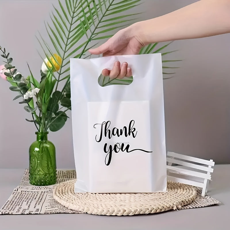 Stylish reusable plastic tote bags, ideal for retail, boutique, gifts, clothing & party favors, with elegant thank you text in black, white, and pink with golden cursive.