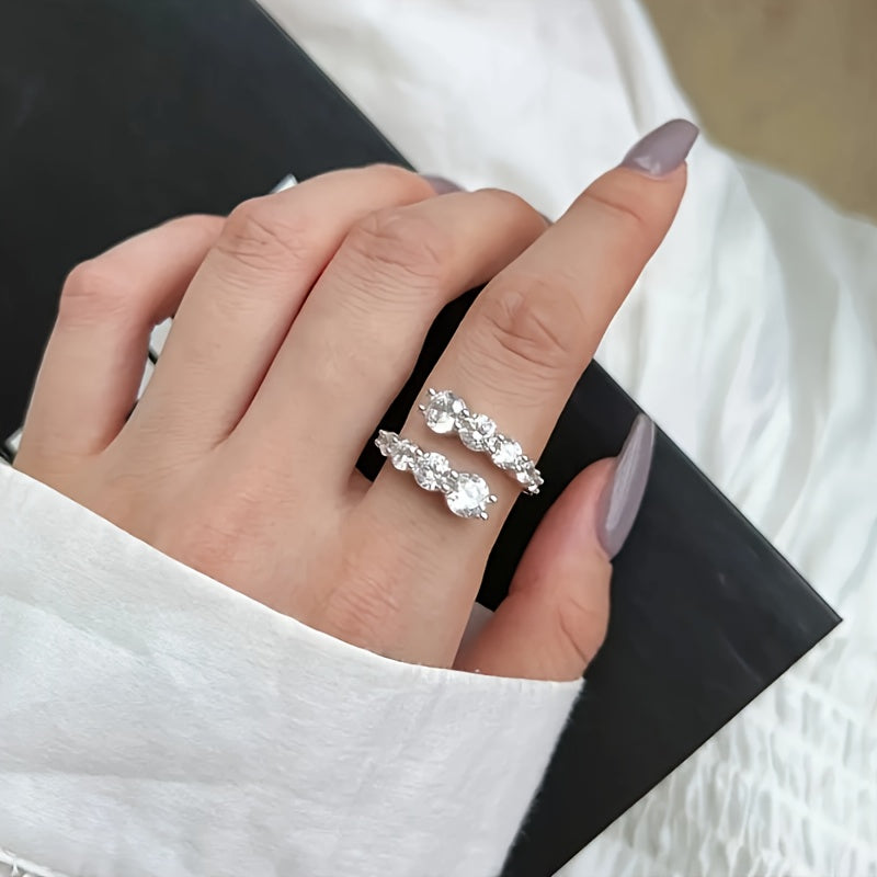 This stunning Vintage Boho cuff ring is crafted from 925 Sterling Silver with a beautiful Moissanite stone. The elegant twisted band design makes it perfect for both daily wear and special occasions. It is a thoughtful gift for Mardi Gras Day or any