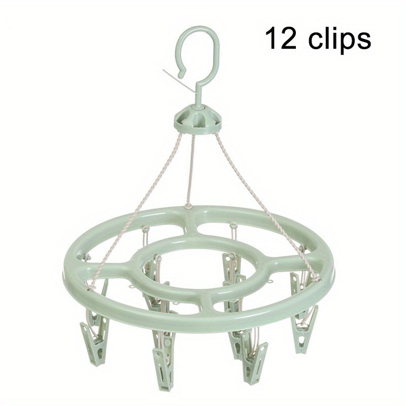 Get the 1pc12 Clip Round Drying Rack made of plastic. It can rotate 360 degrees, making it windproof. Hang your socks easily with this multifunctional rack that can also be used for infant and toddler clothes storage. The hook can also be used for