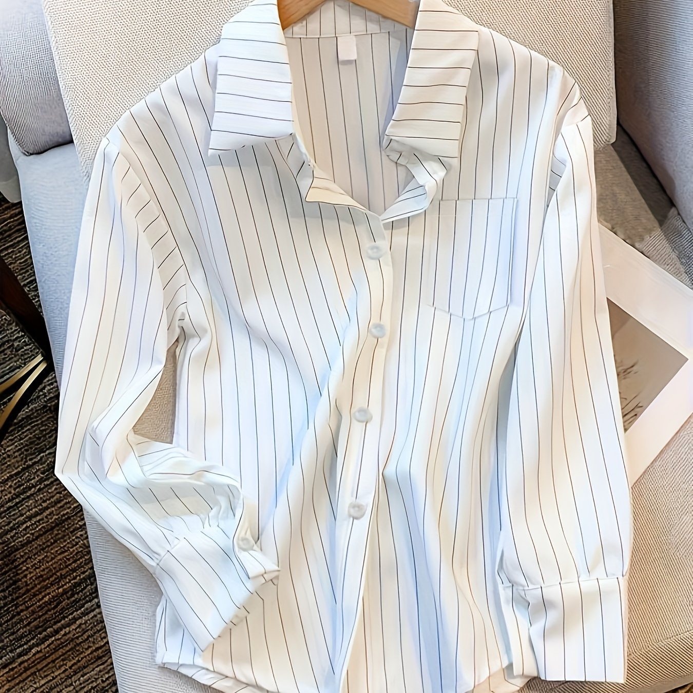 Striped button front shirt with pockets, perfect for spring and fall.