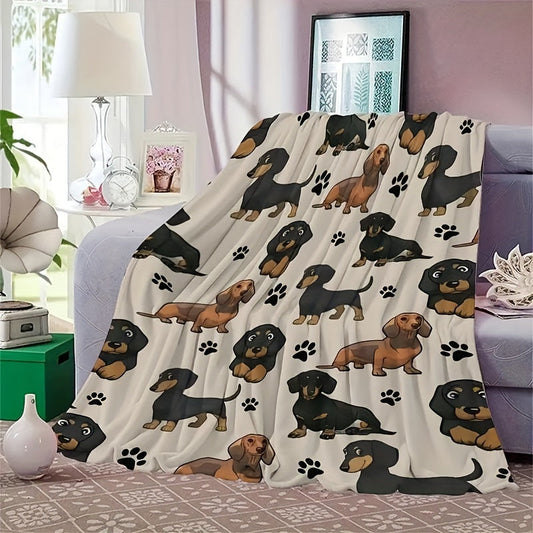 Soft and cozy Dachshund dog print fleece blanket perfect for pet lovers. This all-season throw is machine washable with a digital print design on a polyester cover and lining. Made with 200-250gsm knitted fabric in a contemporary style, this