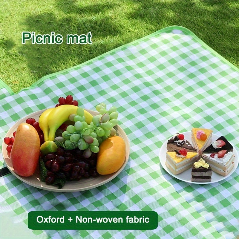 The Grid Pattern Portable Picnic Mat is a Foldable Outdoor Travel Mat made of PVC. It is Waterproof and Moisture-proof, perfect for Camping and Picnics.