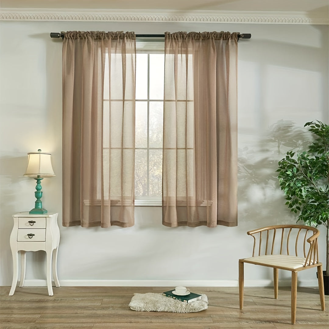 Two panels of sheer curtains with a basic rod pocket design, perfect for adding a touch of elegance to your bedroom, office, living room, yard, kitchen, or any other space in your home.