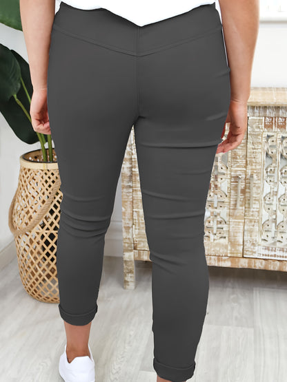 Women's comfortable jogger pants made of stretchy polyester with a drawstring waist, solid color, and machine washable for all-season wear.