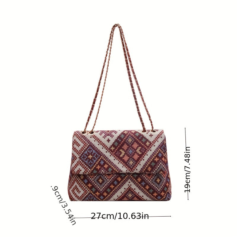 Colorful geometric shoulder bag for women with adjustable strap, magnetic closure, foldable ethnic style, and polyester lining.