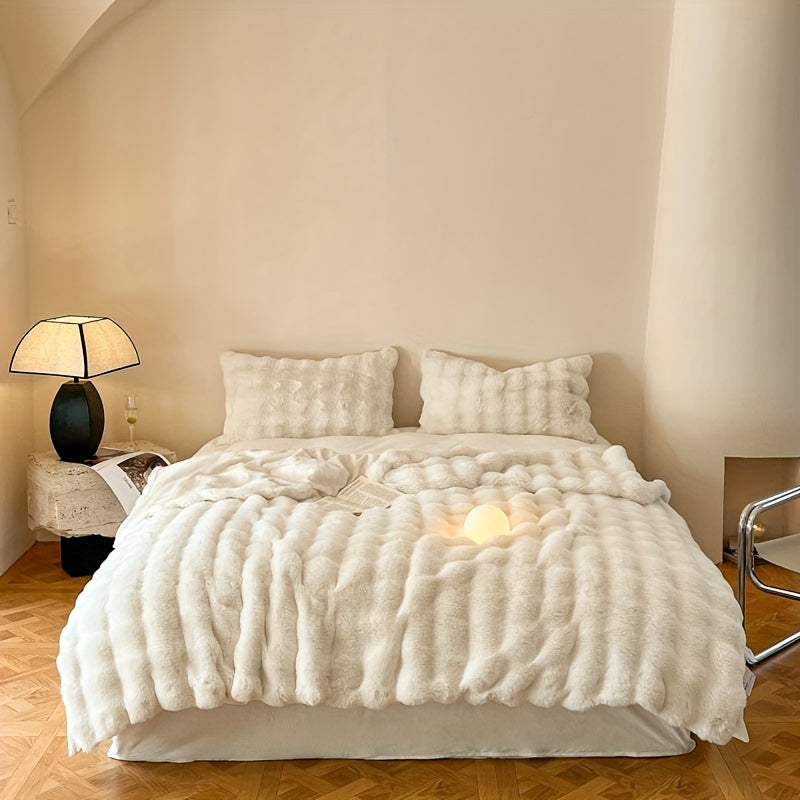 This high quality faux rabbit fur blanket is super soft, comfortable, and warm. It is perfect for all seasons and is ideal for use in the bedroom, office, camping, travel, or as home decoration.