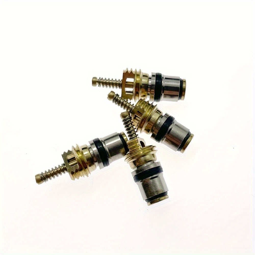 High-quality copper air conditioning refrigerant valve core from Fukang, in a golden finish, compatible with all leading brands.