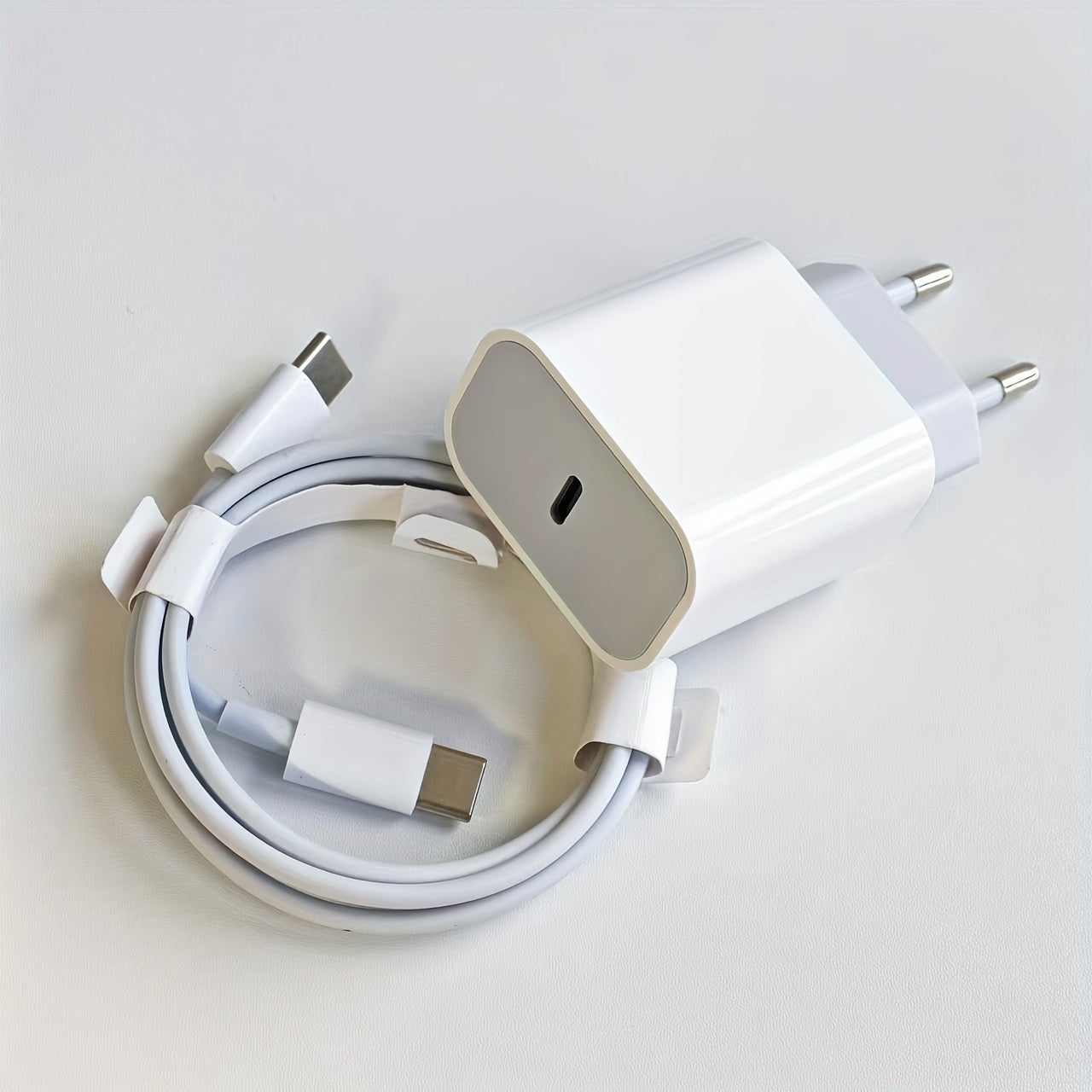 Compact 10W USB-C charger with EU plug, great for European travel, works with iPhone, iPad, Galaxy, and other USB-C devices, ensures safe and smart power delivery.