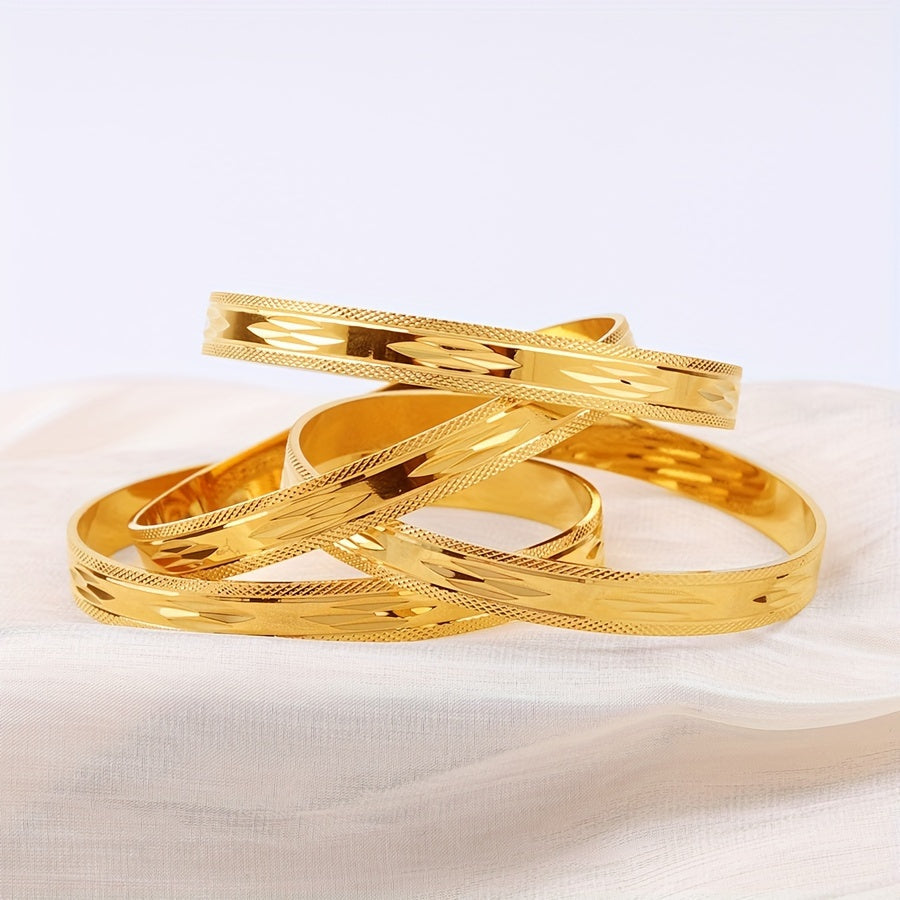 Set of 4 elegant and vintage-style bangles in a golden glossy finish for ladies. These fashion delicate bangles are perfect for both banquet events and daily wear, making them a perfect gift.