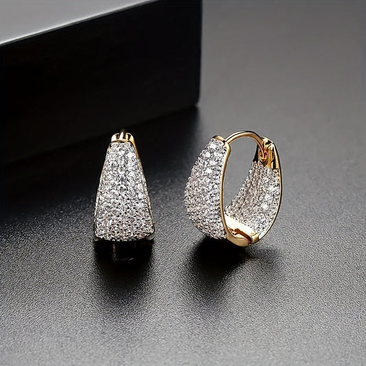 Stylish and versatile earrings adorned with sparkling zirconia, ideal for giving as a gift to friends or loved ones during the holiday season.