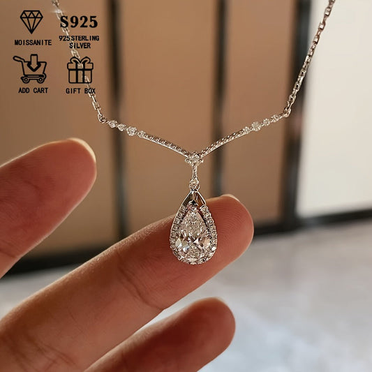 This elegant and dazzling necklace features a 3.6G hypoallergenic S925 silver chain adorned with a pear-shaped 2 carat Moissanite stone. The teardrop-shaped design is perfect for ladies, making it a stunning holiday gift. Presented in a luxurious