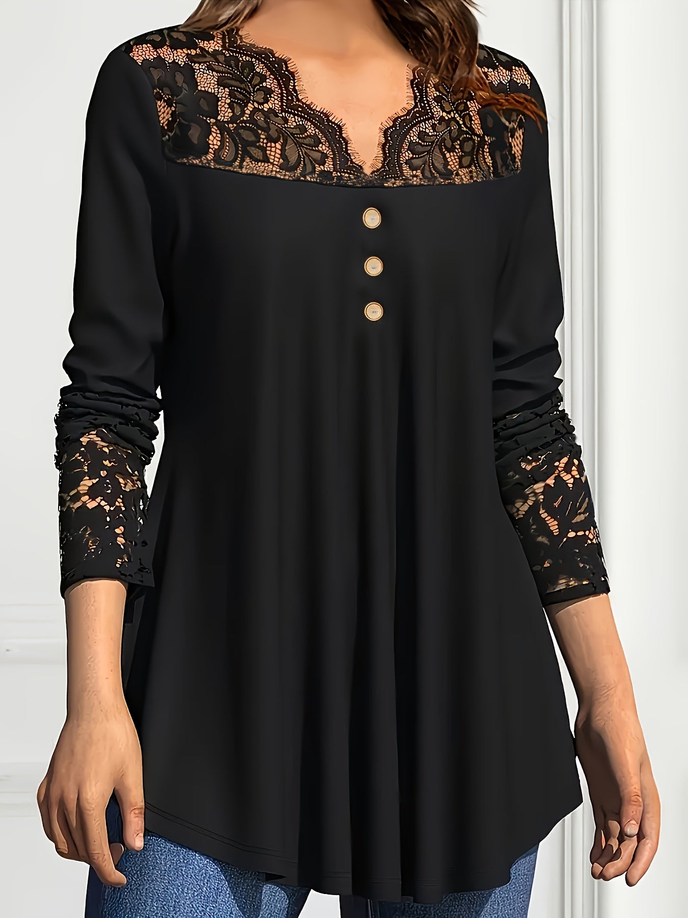 Stylish lace-trim V-neck tunic for plus sizes, with long sleeves, stretchy semi-sheer fabric, color block design, and loose fit.