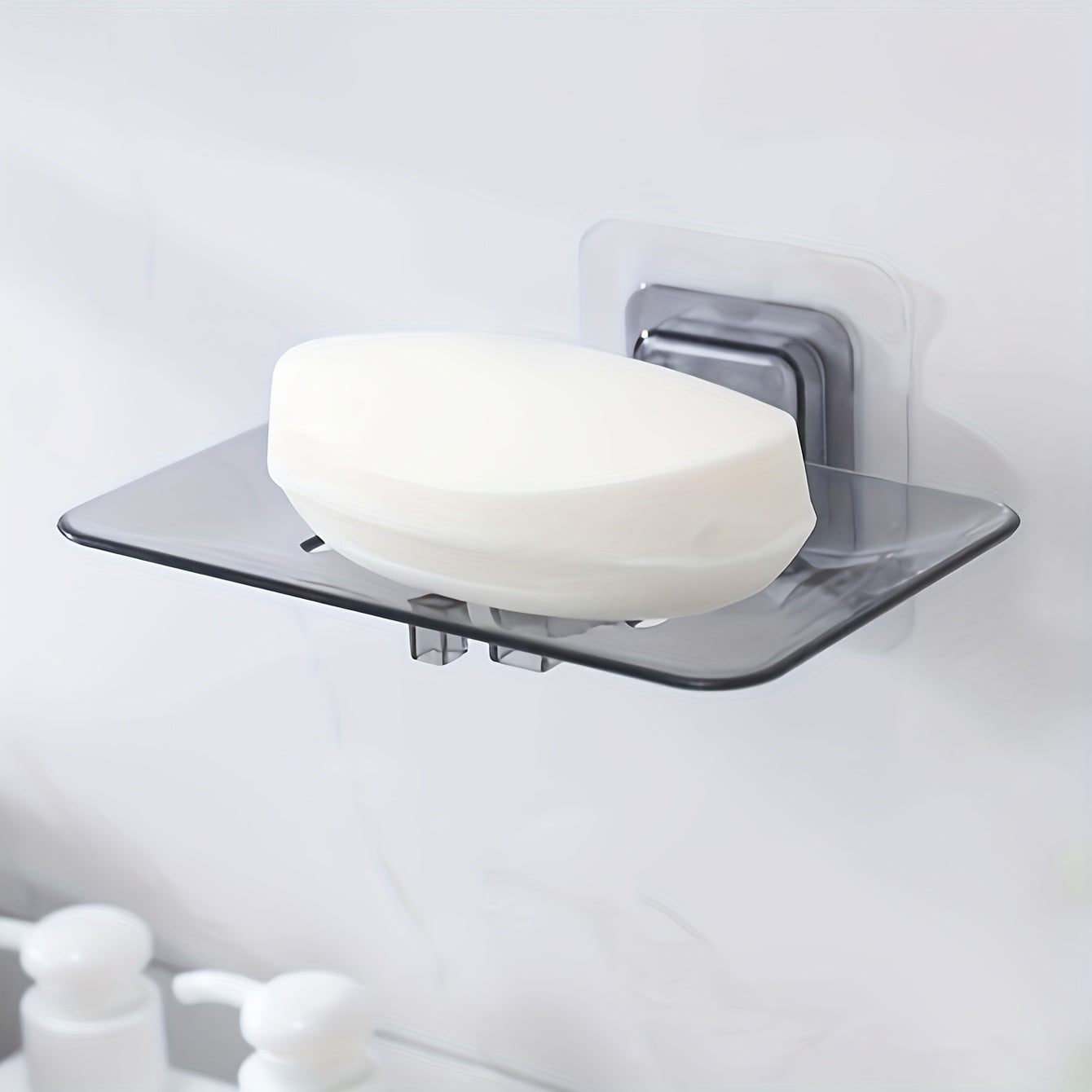 Simple, no-drill wall mount soap dish with strong adhesive for bathroom and kitchen.