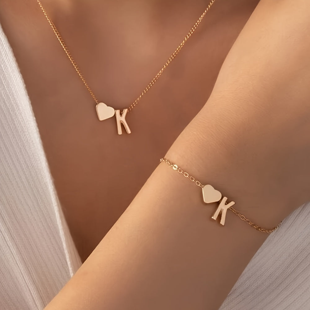 Chic two-piece set with metal heart and letter necklace and bracelet, ideal for daily wear.