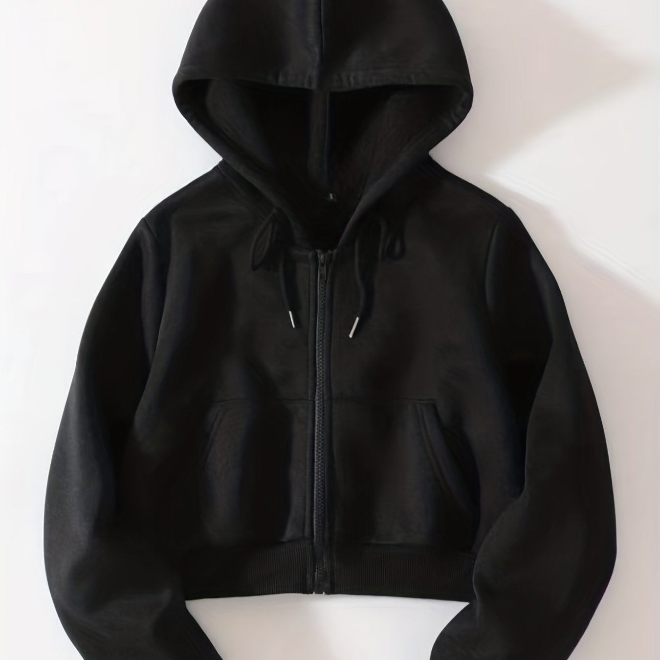 Drawstring zip-up crop hoodie with thermal lining and long sleeves, featuring a front pocket.