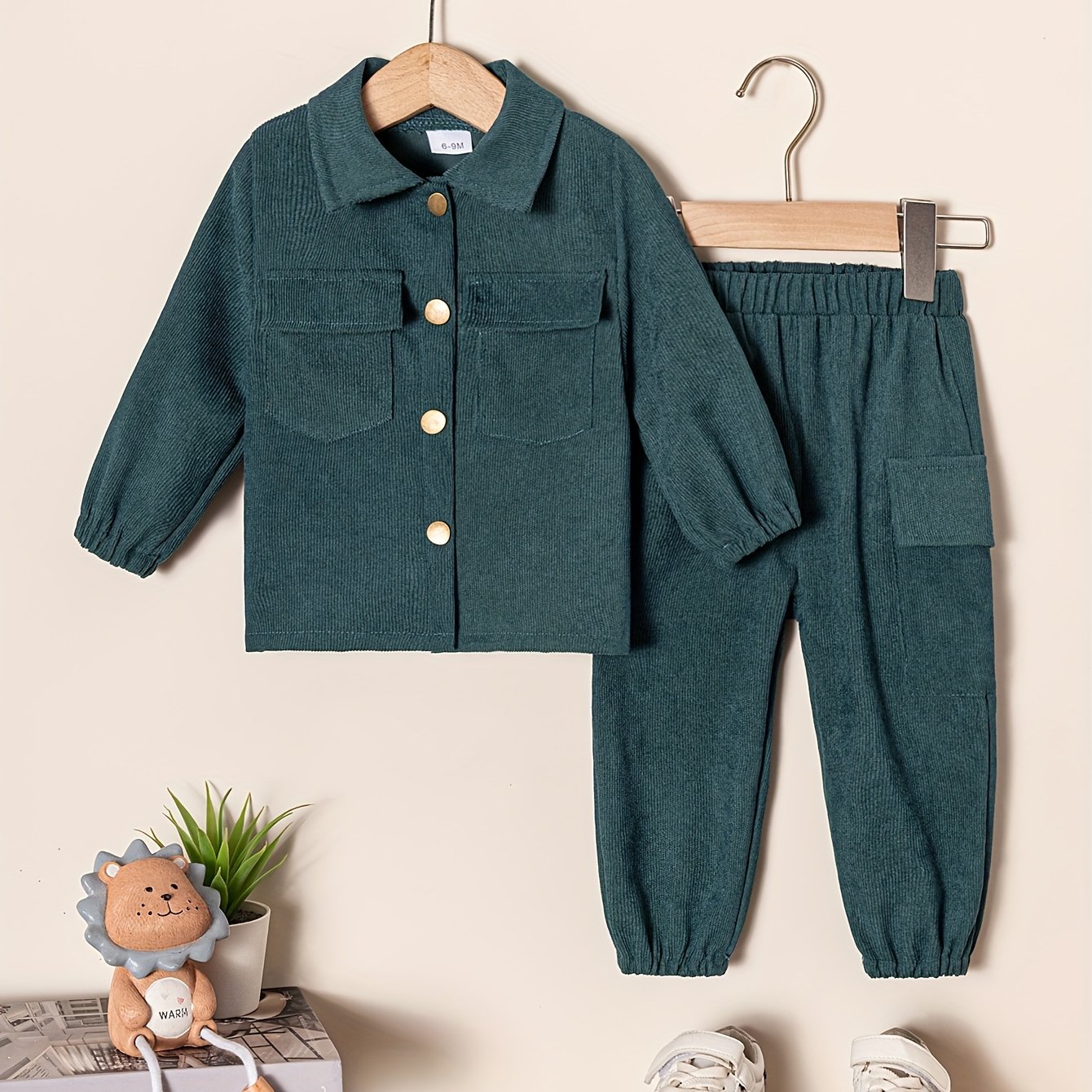 Kids casual outfit set includes stand collar long sleeve shirt coat top with long pants. Made of 100% polyester, suitable for all seasons. Regular fit with solid color and button detail.