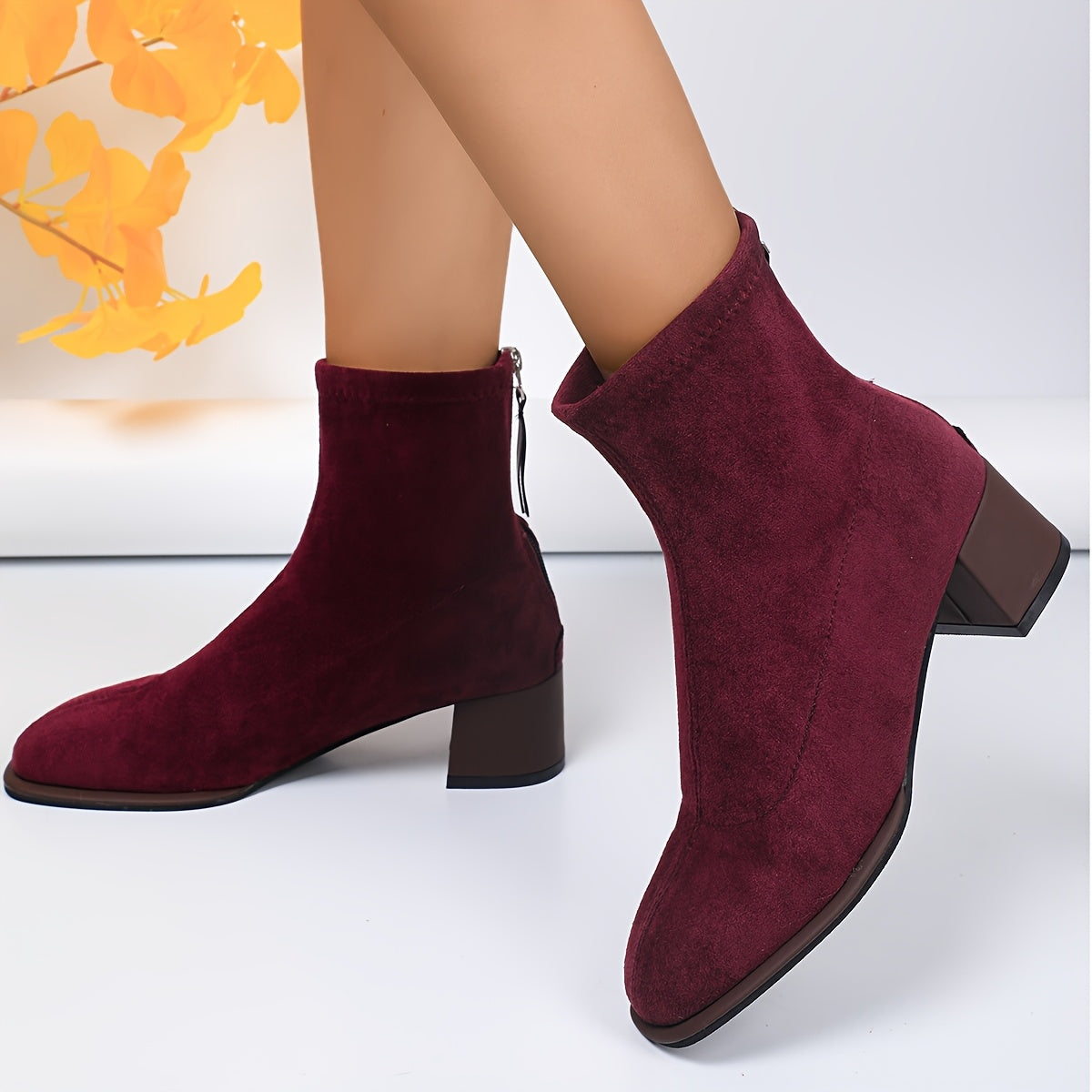 Elegant ankle booties for women with square toe, flannel upper, rubber sole, block heel, and zipper closure - ideal for fall season comfort.