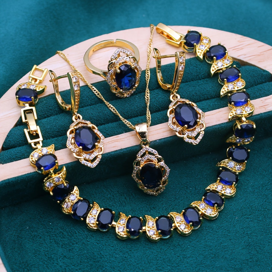 Vintage vacation style jewelry set in 18K gold plated design featuring a beautiful blue gemstone. This set includes a copper mosaic necklace, earrings, ring, and pendant, making it perfect for women to wear at parties, as gifts, or during Christmas. This