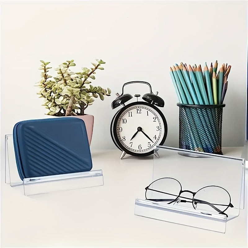 Clear Purse Display Stand, available in either a 5 or 10 piece set. Made from acrylic, this stand is perfect for showcasing wallets, glasses, clutches, handbags, or garage kits on shelves, in closets, or on retail countertops. Stay organized with this