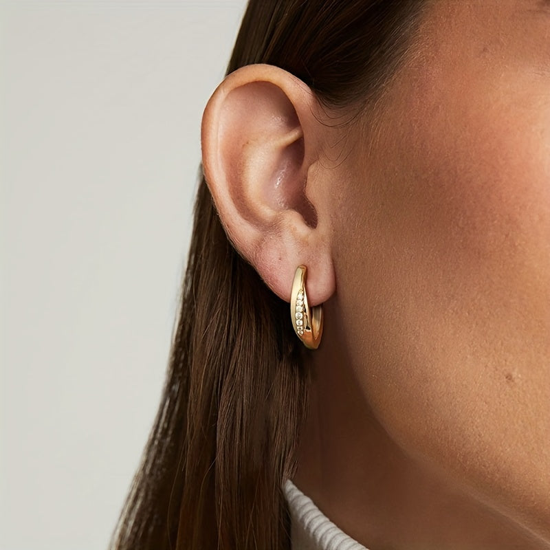 Stunning 925 Sterling Silver Hypoallergenic Hoop Earrings adorned with zirconia, featuring an elegant and simple style that is perfect for women's daily casual wear.