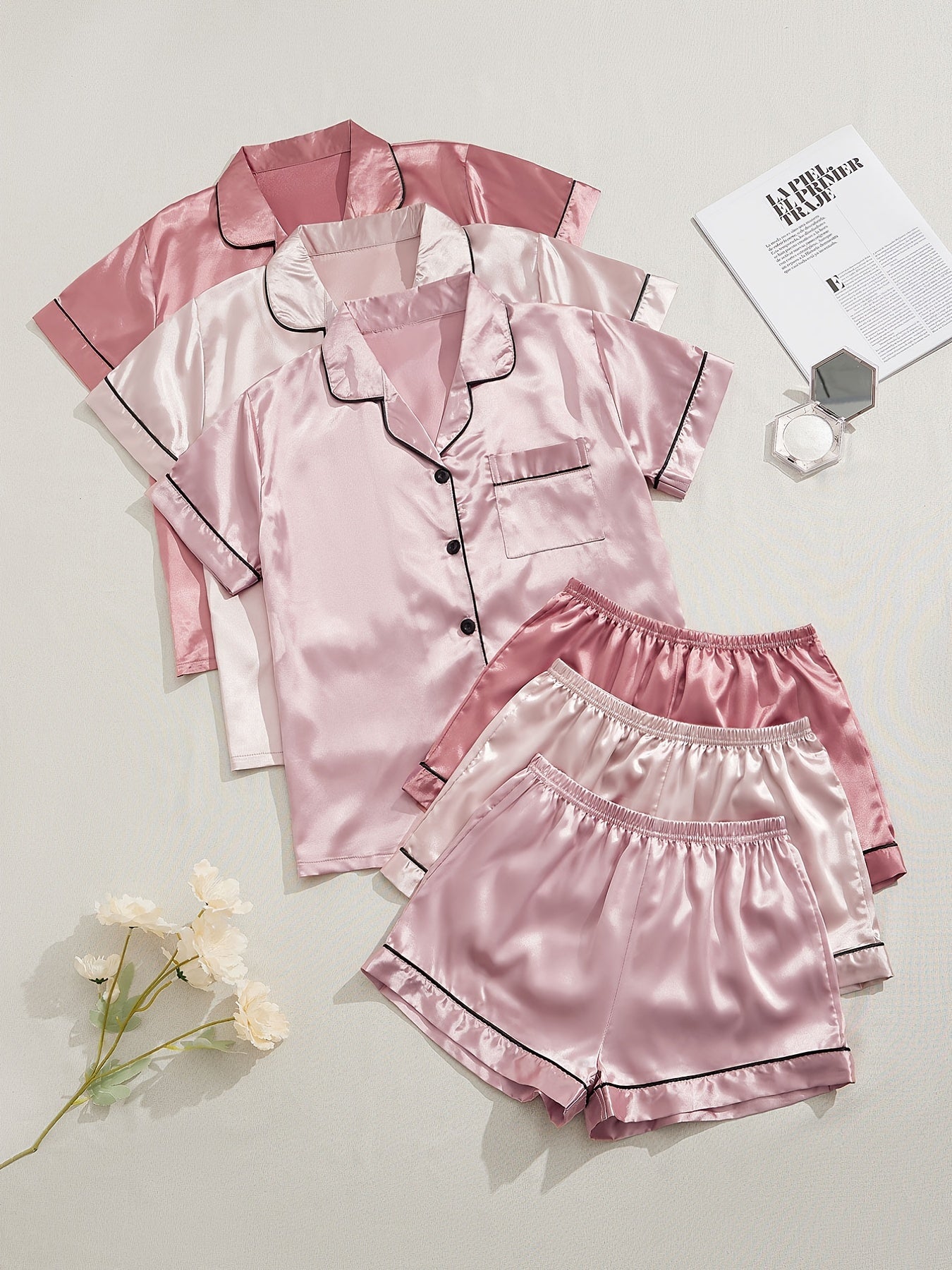 Women's Satin Pajama Set includes short-sleeve top and elastic waistband shorts for sleepwear and loungewear.